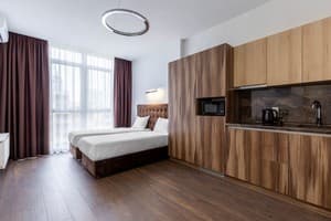 Апарт-отель Barasport city apartments. Апартаменты двухместный DeLuxe Bronze Style с панорамным окном 3