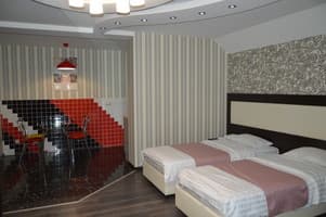 Мини-отель Home Comfort Hotel Левобережная МВЦ. Делюкс 4-местный с большой ванной 6
