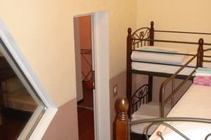 Хостел Voyage. Односпальная кровать в общем номере с 4 кроватями 5